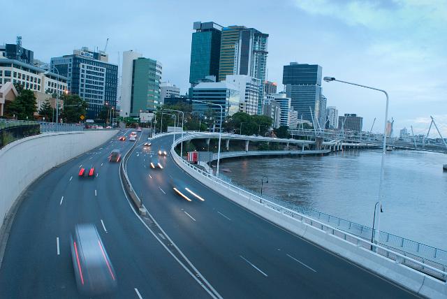 Traffic on Coronation Drive, Brisbane, Australia traveling along the edge of the Brisbane River to and from the city centre