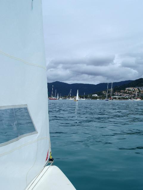 a small sailing dinghy on the water, airlie beach, north queensland