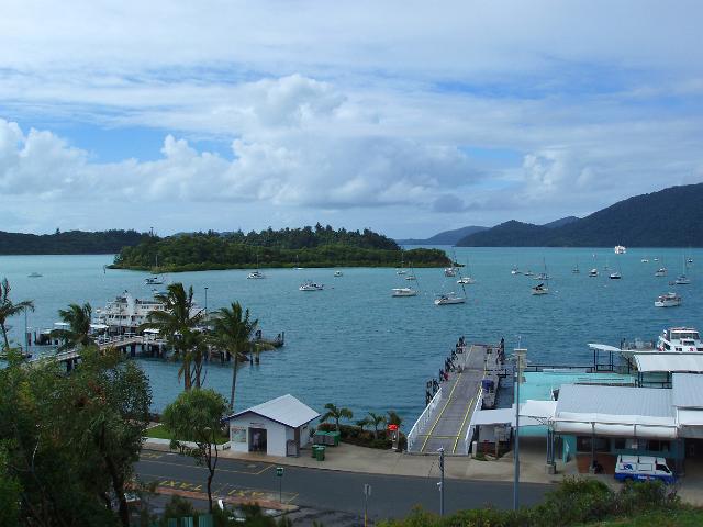 boats in sheltered moorings and the shute harbour ferry terminal, whitsunday, queensland,
