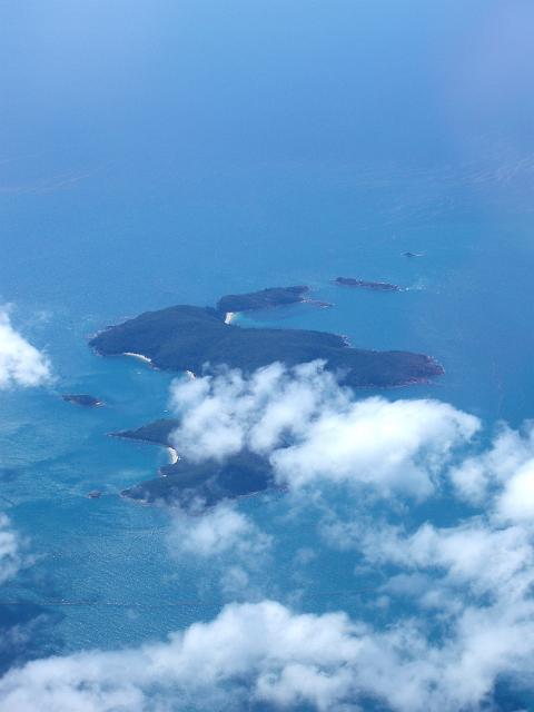 a view from above of one of the 74 whitsunday islands, thomas island