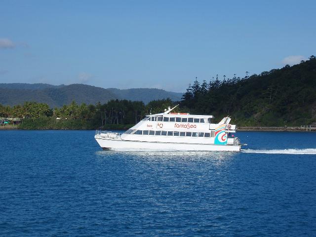 a small ferry off the coast off daydream island, whitsundays, queensland