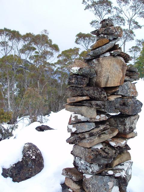 a cairn (piles of stones built to form marker) at the walls of jersulaem