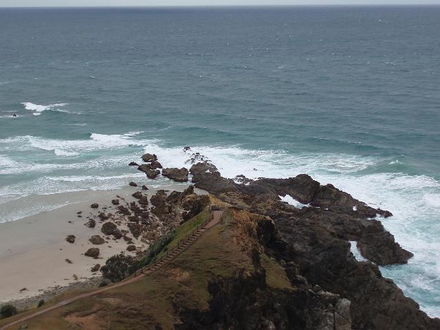 rocks at the bottom of the cliffs of cape byron, australias most easterly point