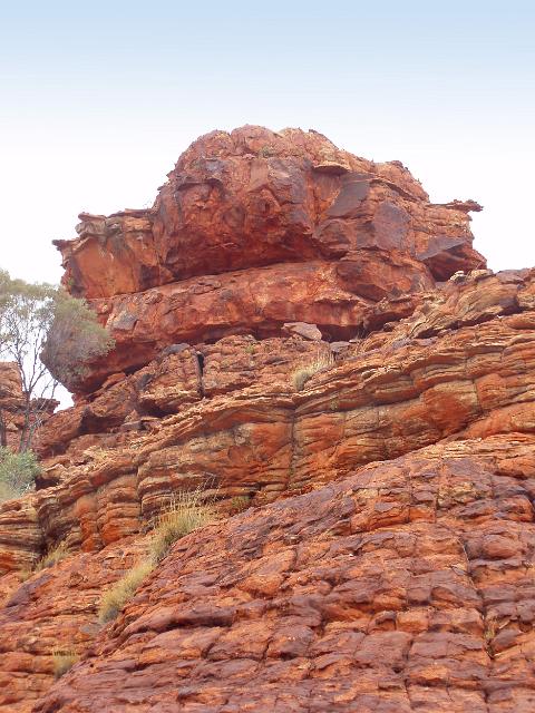 details of a rocky outcrop of colourful red sandstone at kings canyon, NT, Australia