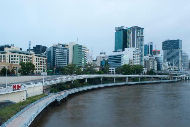 View of the buildings in the CBD in Brisbane with the cycle lanes and Coronation Drive curving round the bank of the Brisbane River