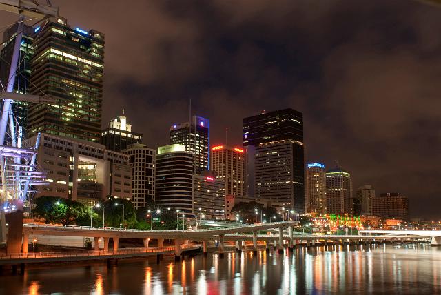Picturesque colourful view of Brisbane at night with the lights from the commercial building ion the CBD reflected in the calm water of the Brisbane River