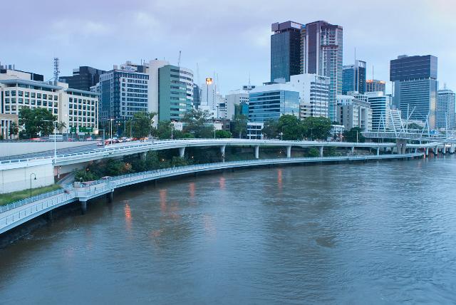 View over the water of the Brisbane River of central Brisbane with Coronation Drive in the foreground