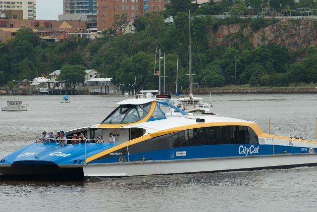 Brisbane River Ferry cruising on along the waterway in brisbane, Queensland, Australia providing an important passenger service and sightseeing for tourists