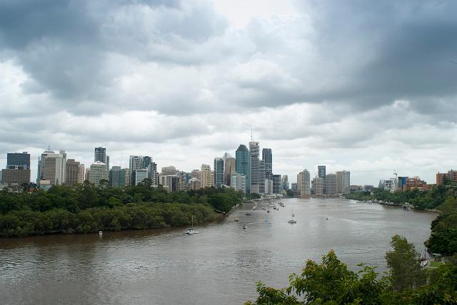 View looking down the Brisbane River of the city of Brisbane from Kangaroo Point on a cloudy day