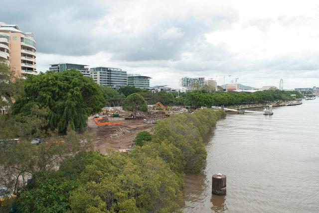 View down the south bank of the Brisbane River in Brisbane with highrise apartment blocks overlooking the water