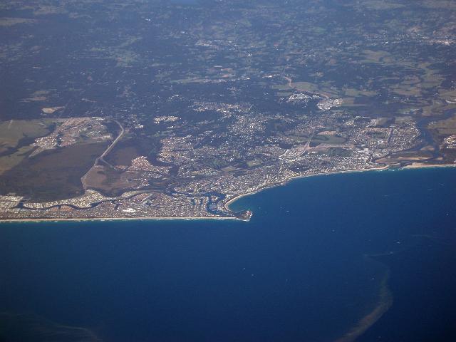 an aerial view of the sunshine coast town of mooloolaba