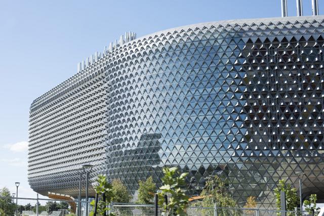 The modern curved facade of the South Australian Health and Medical Research Institute, the SAHMRI building, in Adelaide