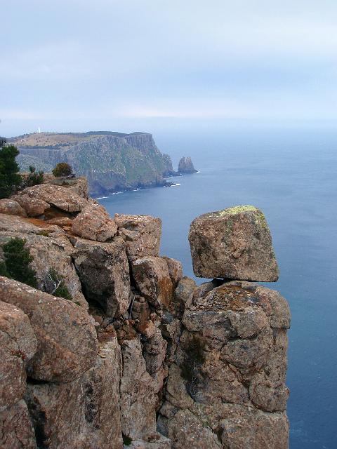 tasman island and lighthouse viewed from a clifftop lookout on cape pillar