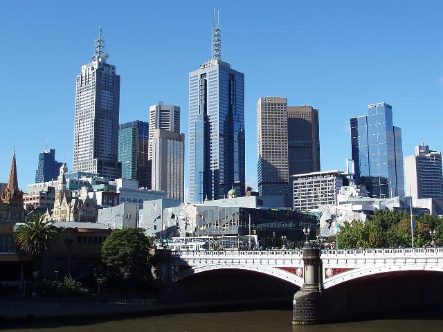 a view of the Princes Bridge and the office towers of downtown melbourne from the southbank of the yarra river