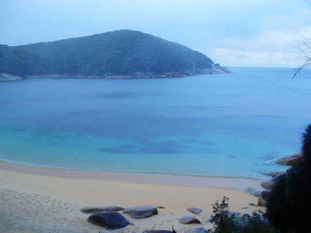 a rainy day over the calm waters of refuge cove, wilsons promontory, victoria
